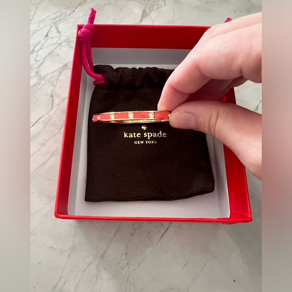 Kate Spade coral and gold bracelet